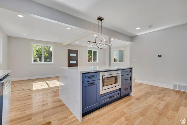 1804 S Park St, Salt Lake City, UT 84105 - kitchen featuring appliances with stainless steel finishes, light wood-style flooring, healthy amount of natural light, recessed lighting, and beam ceiling