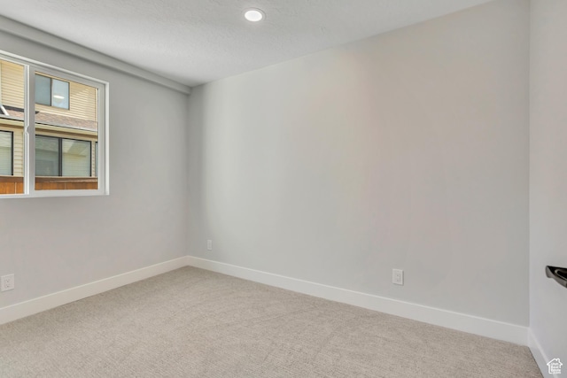 1804 S Park St, Salt Lake City, UT 84105 - empty room with carpet, recessed lighting, and a textured ceiling