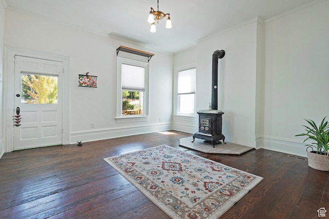 662 E 4th Ave, Salt Lake City, UT 84103 - foyer entrance featuring hardwood / wood-style floors, a wood stove, and ornamental molding