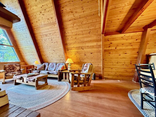 10215 E Moose Rd Unit 1, Brighton, UT 84121 - sitting room with wood finished floors, wood walls, and a wooden ceiling with exposed beams