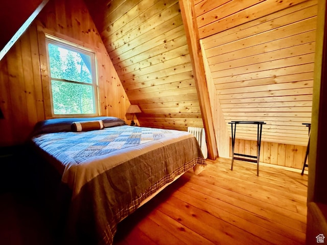 10215 E Moose Rd Unit 1, Brighton, UT 84121 - bedroom featuring hardwood / wood-style floors and wooden walls