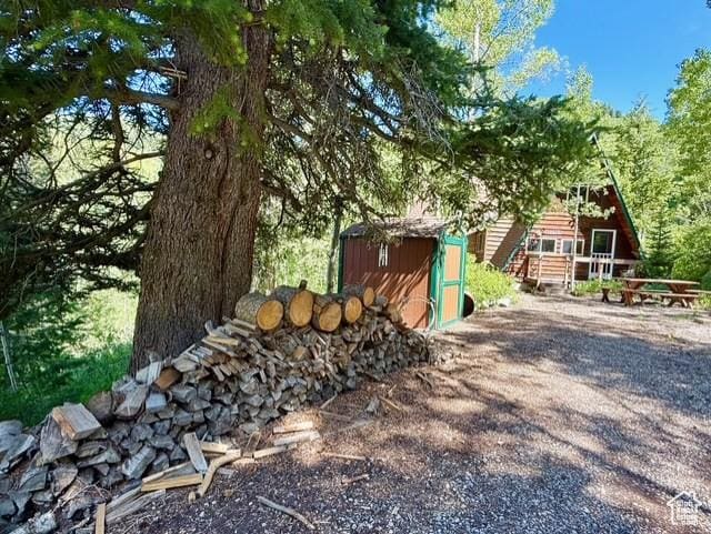 10215 E Moose Rd Unit 1, Brighton, UT 84121 - view of yard with a shed