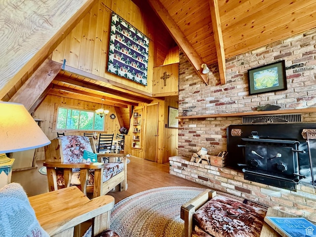 10215 E Moose Rd Unit 1, Brighton, UT 84121 - living room featuring wooden walls, wood finished floors, and a chandelier