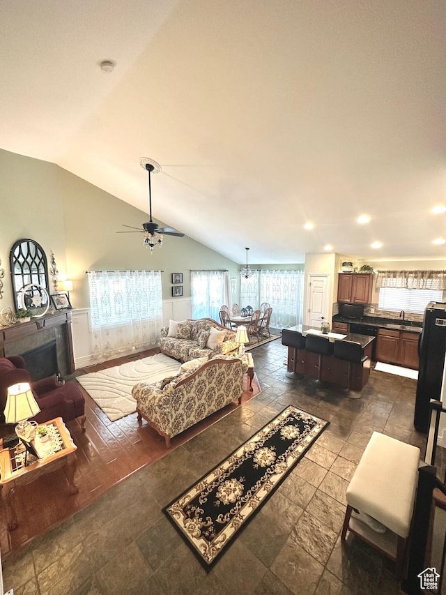 2242 N 2500 W, Lehi, UT 84043 - living area with lofted ceiling, a ceiling fan, and recessed lighting