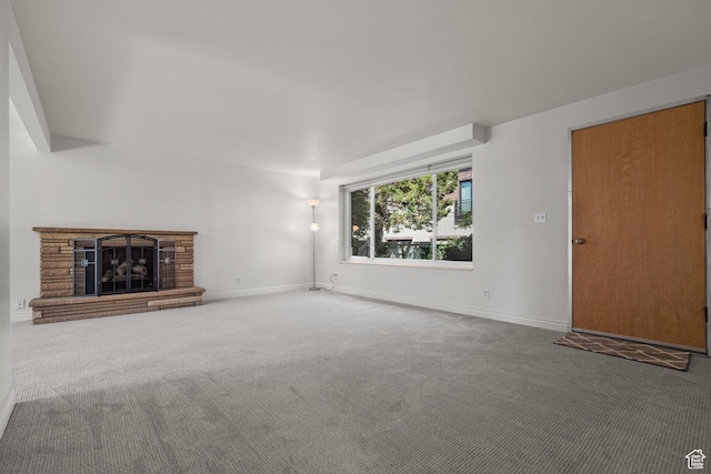 2270 E Murray Holladay Rd S Unit 4, Holladay, UT 84117 - unfurnished living room with carpet flooring and a fireplace