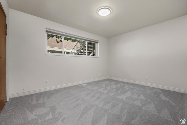2270 E Murray Holladay Rd S Unit 4, Holladay, UT 84117 - empty room featuring carpet floors and baseboards