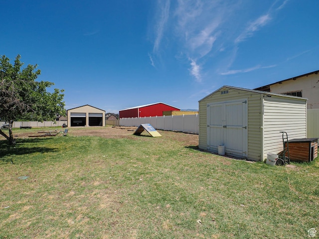 4060 W 2550 S, Taylor, UT 84401 - view of yard with a garage and a shed