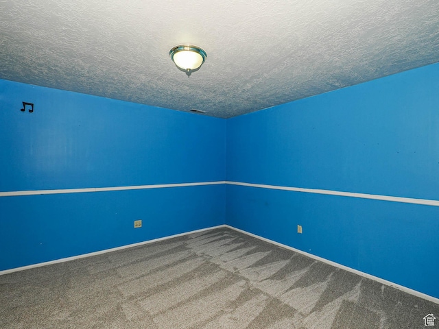 4060 W 2550 S, Taylor, UT 84401 - carpeted empty room featuring a textured ceiling and baseboards