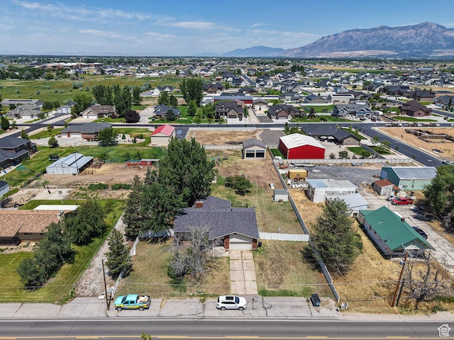 4060 W 2550 S, Taylor, UT 84401 - aerial perspective of suburban area with a mountainous background