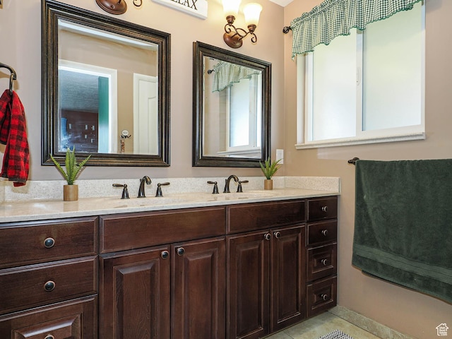 4060 W 2550 S, Taylor, UT 84401 - bathroom featuring double vanity and tile patterned floors