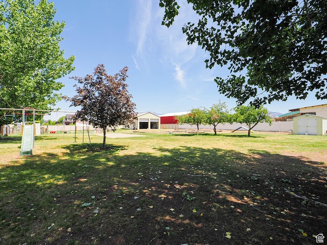 4060 W 2550 S, Taylor, UT 84401 - view of yard featuring a shed