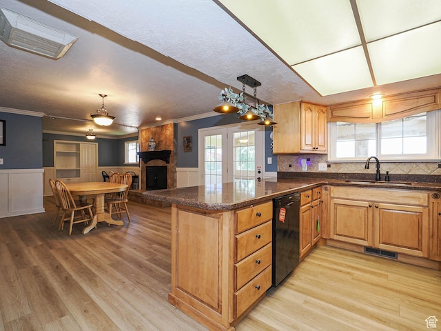 4060 W 2550 S, Taylor, UT 84401 - kitchen with dishwasher, a wainscoted wall, light wood-style flooring, ornamental molding, and a peninsula