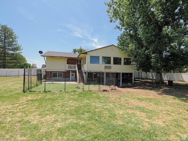 4060 W 2550 S, Taylor, UT 84401 - back of house featuring a fenced backyard, a gate, and stairway