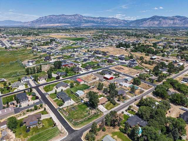 4060 W 2550 S, Taylor, UT 84401 - aerial overview of property's location featuring mountains and nearby suburban area