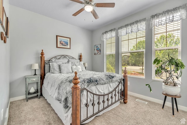 739 S 160 W, American Fork, UT 84003 - bedroom with multiple windows, light colored carpet, and a ceiling fan