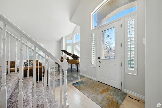 3072 W Current Creek Dr, South Jordan, UT 84095 - foyer entrance featuring stairs, wood finished floors, and lofted ceiling