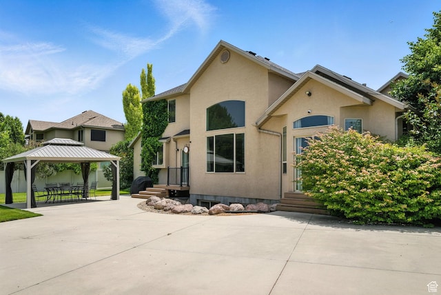 3072 W Current Creek Dr, South Jordan, UT 84095 - view of front of house featuring a gazebo, stucco siding, and a patio