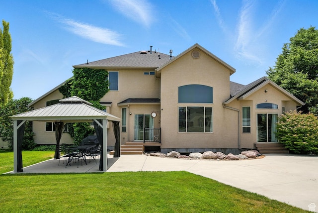 3072 W Current Creek Dr, South Jordan, UT 84095 - back of property featuring a patio area, a gazebo, a lawn, and stucco siding