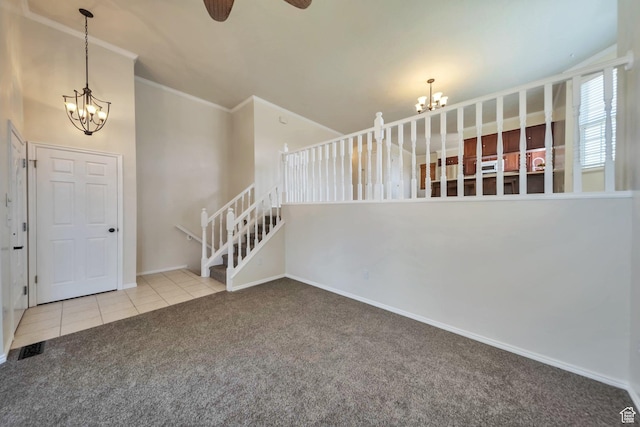 5072 S 1150 E, Ogden, UT 84403 - carpeted foyer with a chandelier, a ceiling fan, tile patterned flooring, and ornamental molding