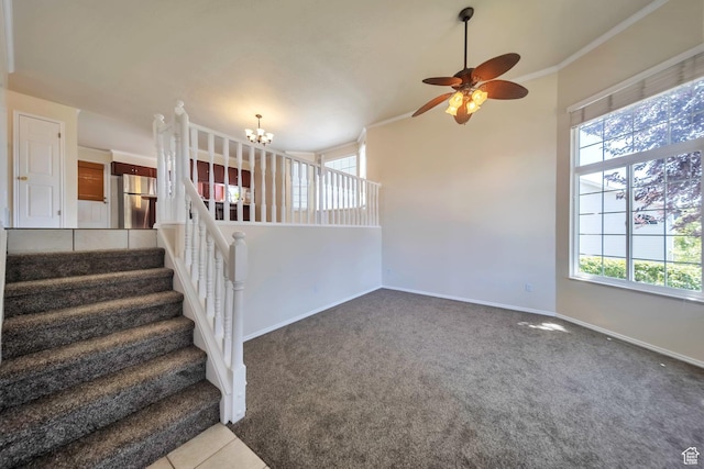 5072 S 1150 E, Ogden, UT 84403 - stairway featuring ceiling fan, carpet flooring, a chandelier, and crown molding