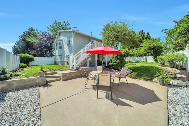 5072 S 1150 E, Ogden, UT 84403 - fenced backyard with a patio area, stairway, and outdoor dining space