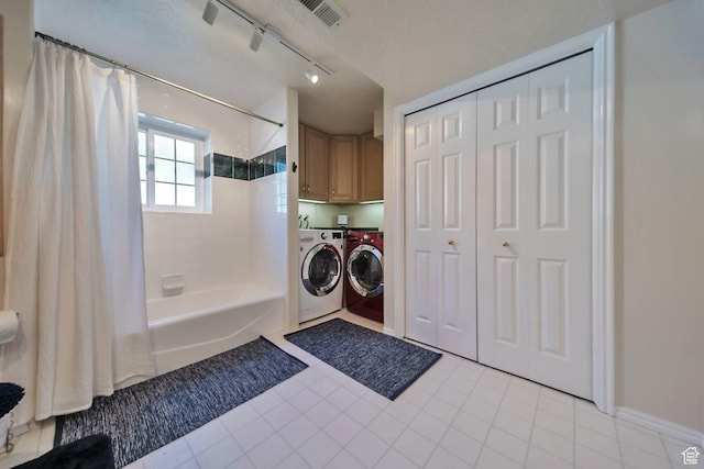 5072 S 1150 E, Ogden, UT 84403 - washroom with washing machine and dryer, light tile patterned floors, and track lighting
