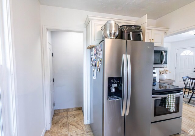 275 N 500 W, Price, UT 84501 - kitchen featuring stainless steel appliances and white cabinets