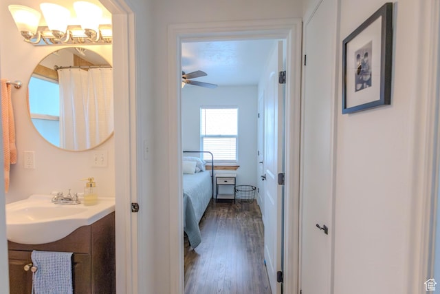 275 N 500 W, Price, UT 84501 - full bathroom with vanity, wood finished floors, ceiling fan, and ensuite bath