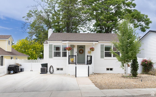 275 N 500 W, Price, UT 84501 - view of front facade featuring a chimney and roof with shingles