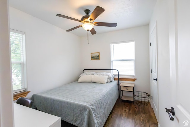 275 N 500 W, Price, UT 84501 - bedroom with multiple windows, dark wood finished floors, and a ceiling fan