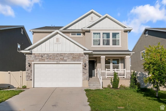 194 N Valcrest Dr, Saratoga Springs, UT 84045 - craftsman inspired home featuring board and batten siding, stone siding, a porch, and concrete driveway