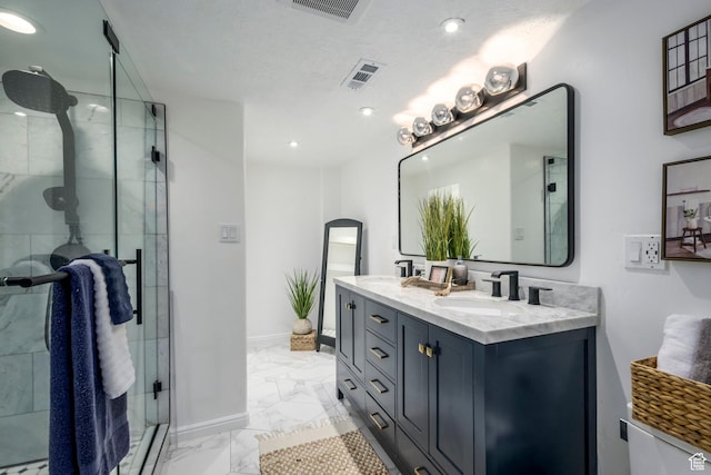 1918 E Ramona Ave S, Salt Lake City, UT 84108 - full bathroom featuring marble finish flooring, double vanity, a stall shower, and recessed lighting