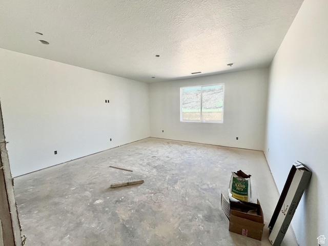 1843 S 920 W, Hurricane, UT 84737 - unfurnished room with a textured ceiling and concrete flooring