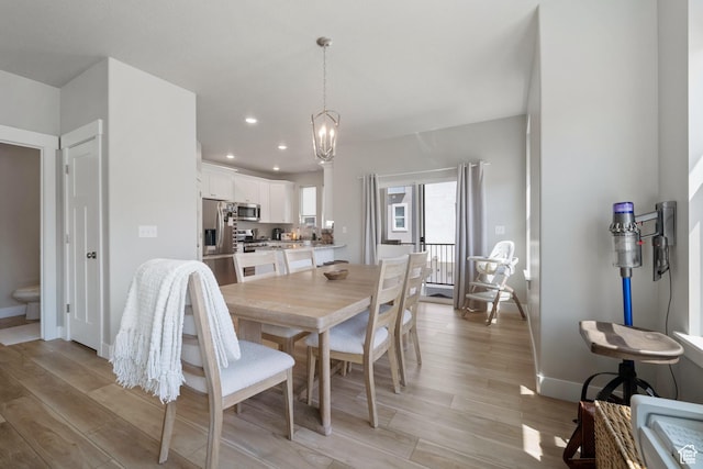 1044 S 2800 E, Spanish Fork, UT 84660 - dining room featuring light wood-style flooring, a chandelier, and recessed lighting