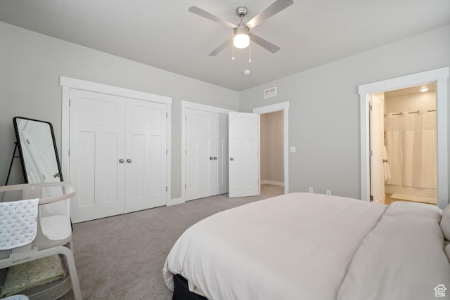 1044 S 2800 E, Spanish Fork, UT 84660 - bedroom featuring multiple closets, light colored carpet, ensuite bathroom, and ceiling fan
