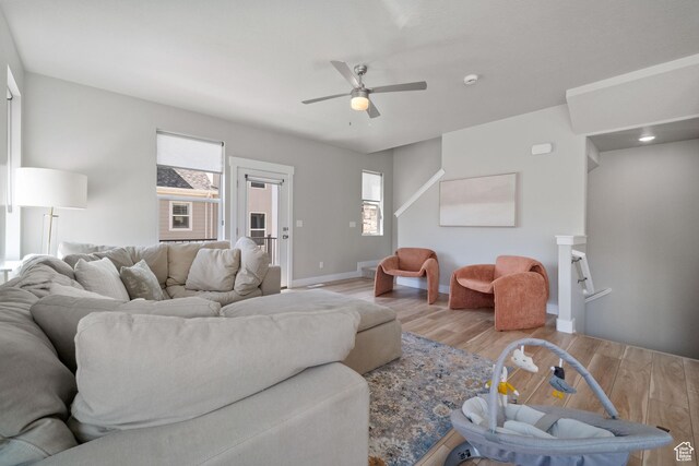 1044 S 2800 E, Spanish Fork, UT 84660 - living area featuring wood finished floors, healthy amount of natural light, and ceiling fan