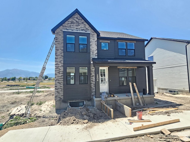 2804 W 2710 N Unit 87, Plain City, UT 84404 - view of front of property featuring a mountain view and covered porch