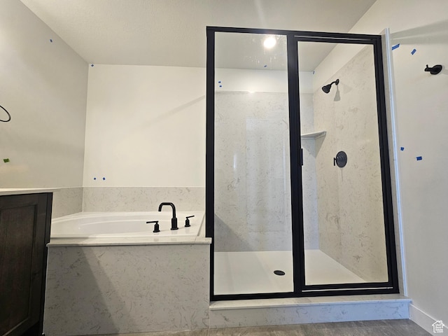 2804 W 2710 N Unit 87, Plain City, UT 84404 - full bathroom featuring a garden tub and a shower stall