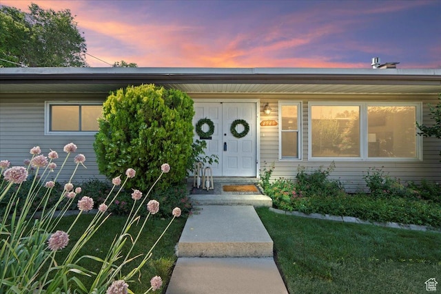 4549 S Tanglewood Dr E Unit 4549, Holladay, UT 84117 - exterior entry at dusk featuring a porch