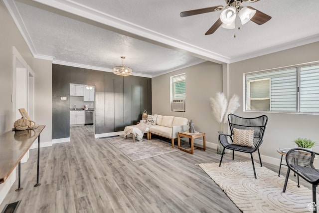 2056 Liberty Ave, Ogden, UT 84401 - living room with a textured ceiling, light wood-type flooring, ornamental molding, ceiling fan, and cooling unit
