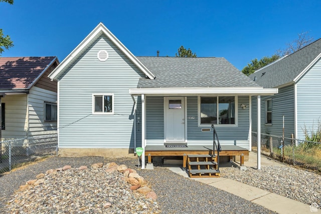 2056 Liberty Ave, Ogden, UT 84401 - view of front of home with a porch and a shingled roof