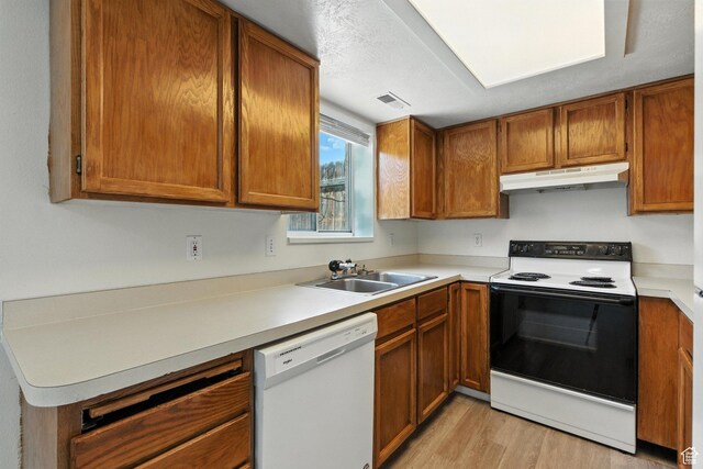 1731 W 800 N, Pleasant Grove, UT 84062 - kitchen featuring white appliances, under cabinet range hood, and brown cabinetry