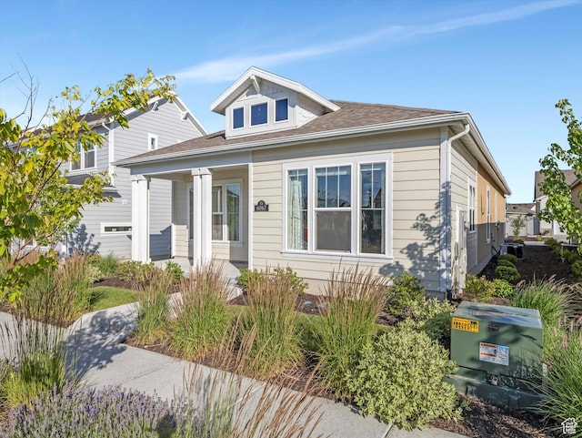 6067 W Whisle Stop Rd S, South Jordan, UT 84009 - bungalow featuring a shingled roof and covered porch