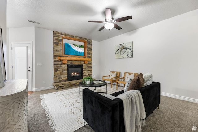 3315 W Birch Creek Rd S Unit 28D, West Haven, UT 84401 - living room with a ceiling fan, carpet flooring, and a stone fireplace