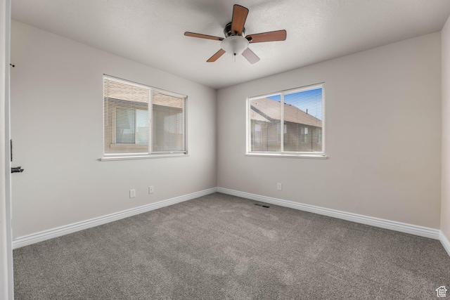 3315 W Birch Creek Rd S Unit 28D, West Haven, UT 84401 - empty room featuring carpet and ceiling fan