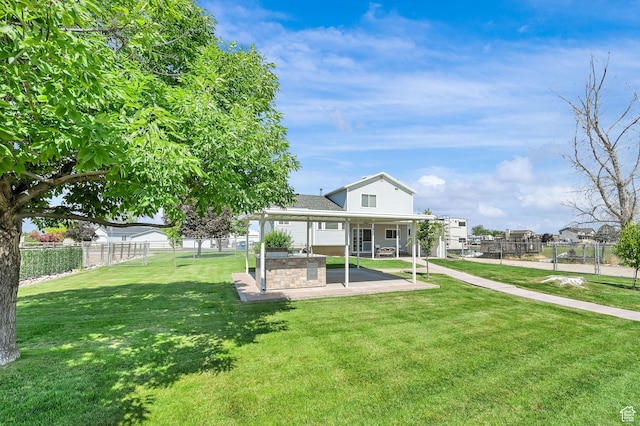 3972 S 4450 W, West Haven, UT 84401 - back of property featuring a patio and a fenced backyard