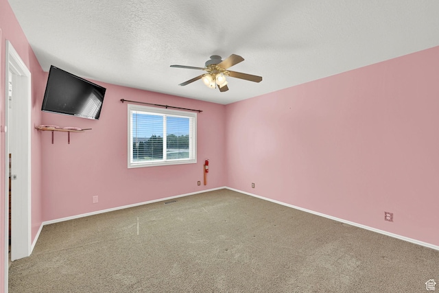 3972 S 4450 W, West Haven, UT 84401 - spare room with ceiling fan, carpet flooring, and a textured ceiling