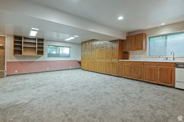 1814 E 9800 S, Sandy, UT 84092 - kitchen featuring brown cabinets, carpet flooring, white dishwasher, recessed lighting, and light countertops