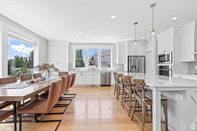 10262 N Yorkshire Cir, Highland, UT 84003 - dining room with recessed lighting and light wood finished floors