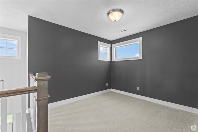10262 N Yorkshire Cir, Highland, UT 84003 - unfurnished room with healthy amount of natural light and light colored carpet